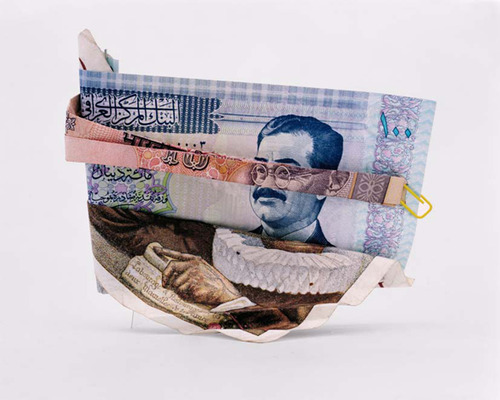 French photographer Philippe Pétremant creates incredible portraits using folded banknotes from different countries in this series entitled “Les Sept Mercenaires”