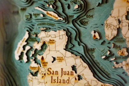 Lasercut Underwater-Topographic maps made from wood by 'Below the Boat' 