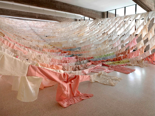 Suspended Shirt Installations by Finish artist and environmentalist Kaarina Kaikkonen who uses hundreds of second-hand shirts to create her often site specific installations.